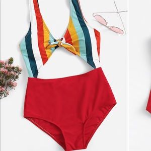 Adorable one piece, never worn.